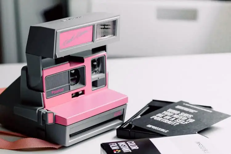 Black and pink polaroid land camera
